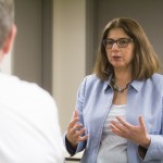 Dr. Sue instructing in a classroom.
